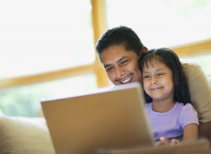 Father and daughter reading